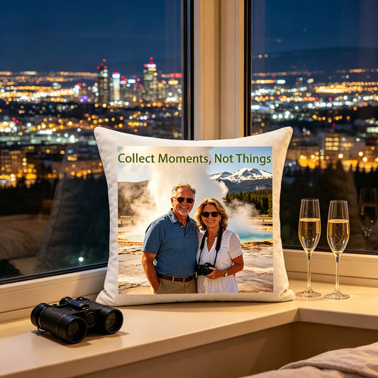 Custom travel keepsake pillow resting on a city apartment windowsill, overlooking a glowing skyline at night, with binoculars and champagne flutes nearby. A cozy, romantic scene showing the pillow as a reminder of adventure against the city lights.