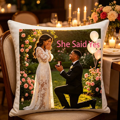 Custom engagement photo pillow placed on a chair at a candlelit engagement dinner table, surrounded by flowers and glowing candles. A charming touch for engagement parties, bridal showers, or romantic home dinners.