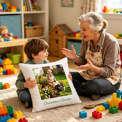 Custom Grandma's Garden photo pillow held by a grandmother and grandchild in a sunlit playroom, surrounded by building blocks. A tender, joyful scene showing the pillow as a bridge between generations and shared memories of Grandma’s garden.