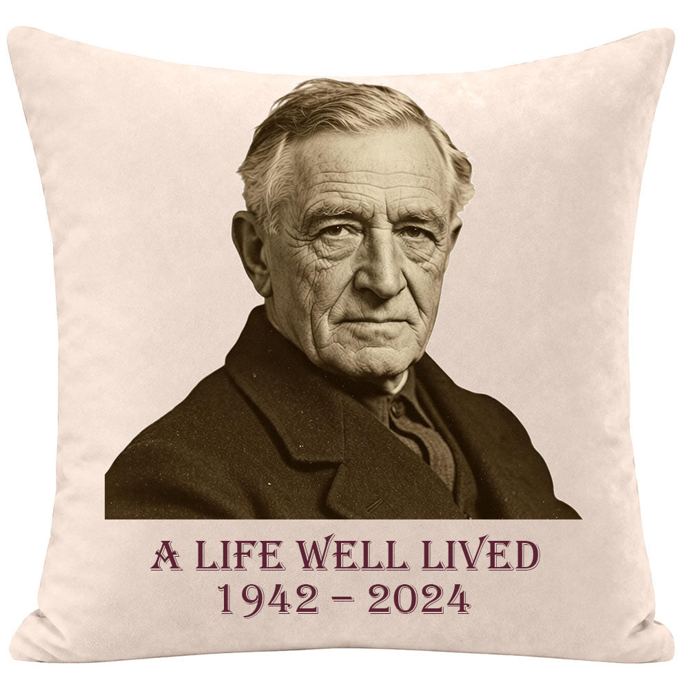 Custom memorial pillow for dad with a vintage-style portrait of an elderly man, personalized with "A Life Well Lived" and years 1942-2024, sympathy keepsake for remembering a father or grandfather, soft cream fabric throw pillow.
