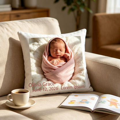 Personalized newborn keepsake pillow resting on a cozy beige living room sofa, next to a coffee cup and children’s storybook. A gentle, everyday reminder of your baby’s first moments.