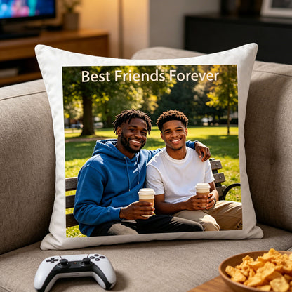Custom best friends keepsake pillow on a living room sofa, next to a video game controller and bowl of chips. A casual, fun touch perfect for game nights with best friends.