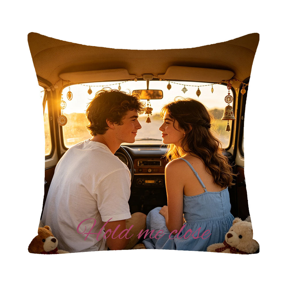Personalized couple photo pillow with "Hold me close" text, young couple smiling at each other in a decorated vintage car at sunset, romantic keepsake for couples, custom home decor