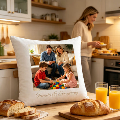 Custom family keepsake pillow resting on a wooden kitchen counter, surrounded by fresh bread and orange juice glasses. A warm, homey scene showing the pillow as part of daily family routines and morning meals.