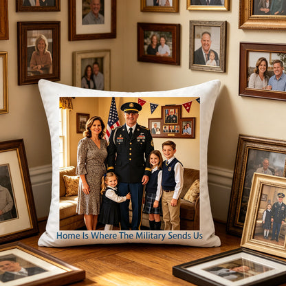 Custom military family keepsake pillow displayed on a wooden floor, surrounded by framed military and family photos. Blends seamlessly with a service member’s memory wall, honoring their family’s service journey.