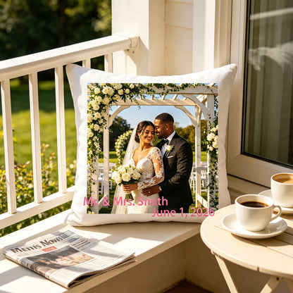 Custom wedding photo pillow resting on a sunlit balcony ledge, with coffee cups and a newspaper nearby. A cozy morning reminder of the couple’s special day, ideal for newlywed home decor.