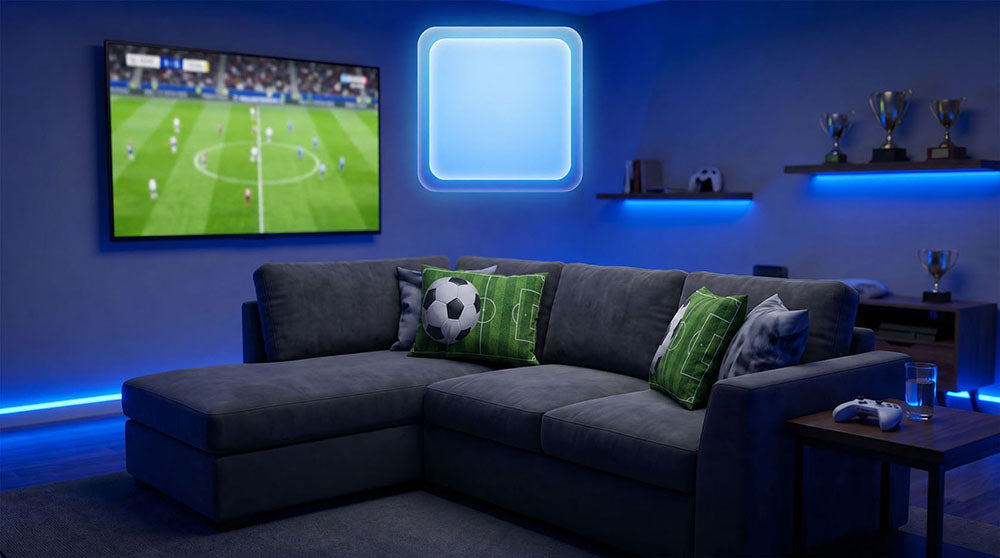 World Cup soccer fan game room with LED ambient lighting, green pitch print football cushions on dark L-shaped sofa, ultimate sports viewing home decor customizable with team logo & custom photos.